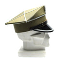 Genuine Polish military officer peaked cap with eagle insignia and black visor displayed on white mannequin head.