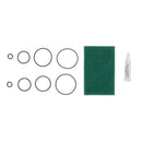 Katadyn Combi maintenance kit with 8 O-rings, silicone lubricant tube, and green cleaning pad for water filter upkeep.