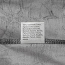 Close-up of a fabric label showing 100% cotton material inside a gray U.S. Army style camo t-shirt.
