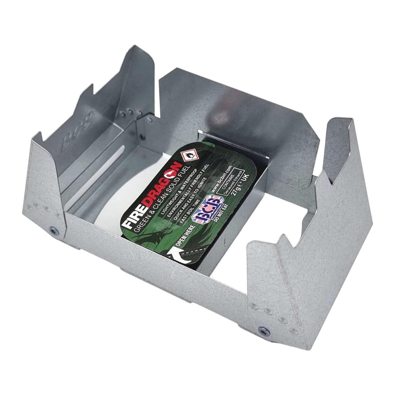 Compact BCB FireDragon folding pocket stove with fuel block for easy camping and hiking cooking and fire starting.