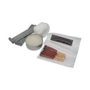 Candle, matches, and lighter on a white background