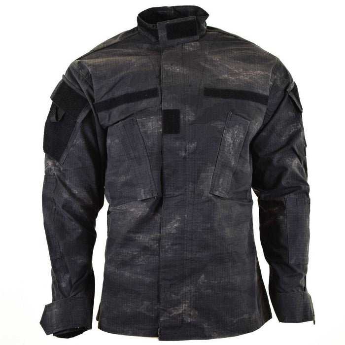 US style combat jacket in grey ACU ripstop camo with adjustable cuffs and hook and loop attachment plates.
