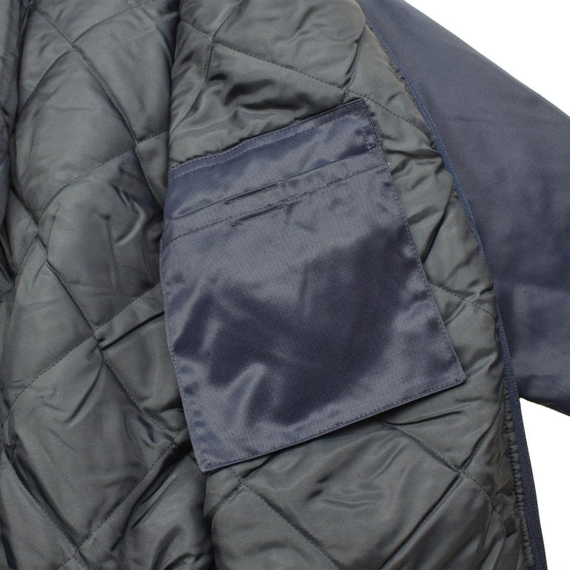 Close-up of the quilted liner and inside pocket of the blue Lambert French Air Forces bomber jacket