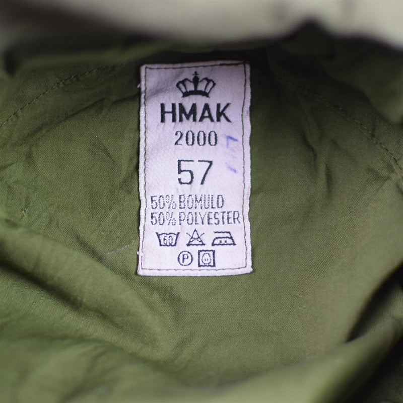 Close-up of Danish Army field cap label showing size 57 and material composition 50% cotton 50% polyester