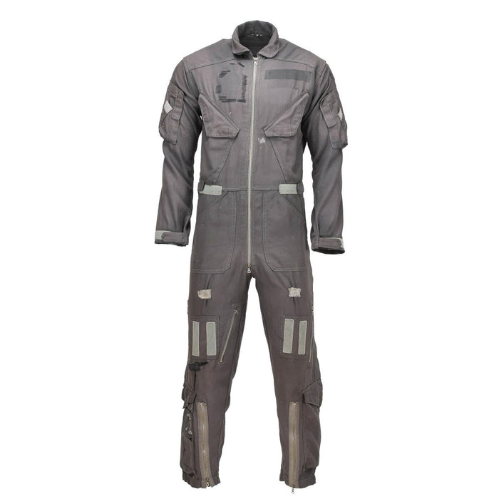 Vintage Dutch Air Force pilot jumpsuit in worn gray military surplus with multiple pockets and front zipper closure