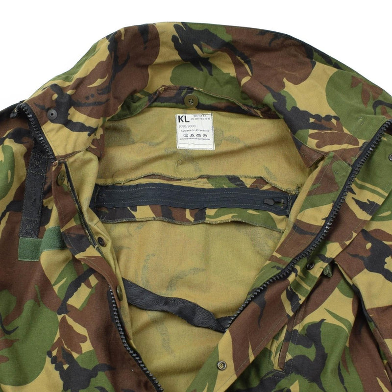 Close-up of genuine Dutch military tanker coverall with DPM camouflage and zippered inner pocket, high neck visible