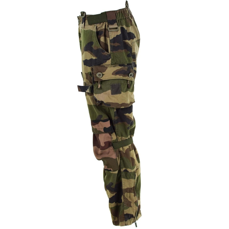 Side view of French army combat pants in CCE camouflage ripstop fabric with multiple pockets and adjustable straps