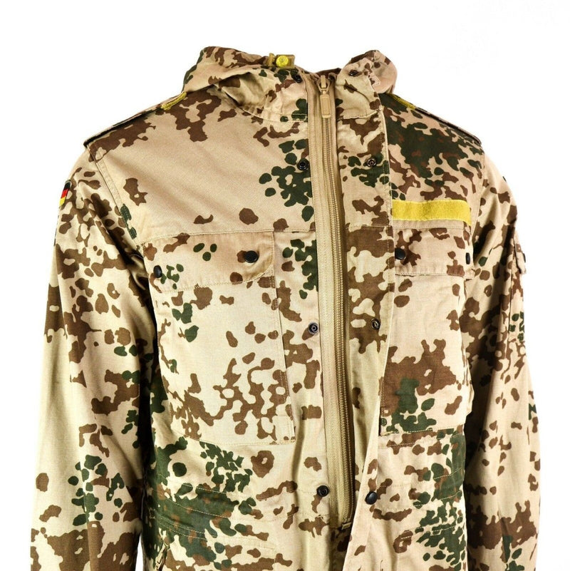 Genuine German army desert camo field jacket parka with hood, multiple pockets, adjustable cuffs, and rugged fabric.