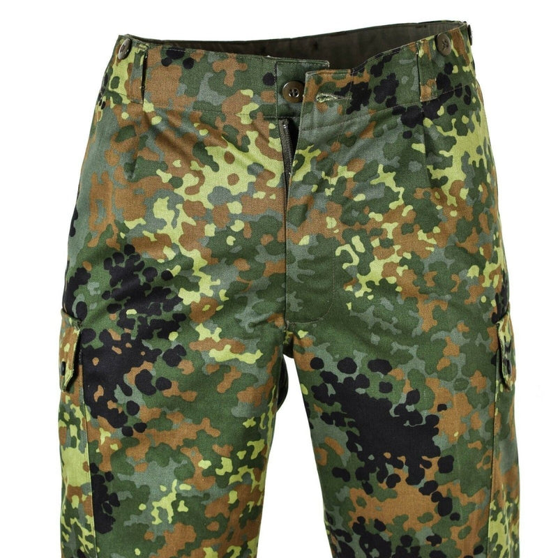 German army issue Flecktarn camouflage combat pants with durable fabric and multiple pockets for field use.