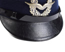 Vintage German Luftwaffe Air Forces peaked visor cap with blue wool body and detailed metal insignia on front