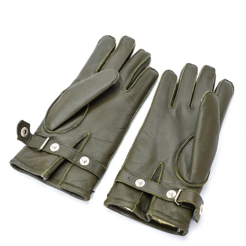 Pair of genuine German police olive leather gloves with wool lining and adjustable wrist straps for winter warmth