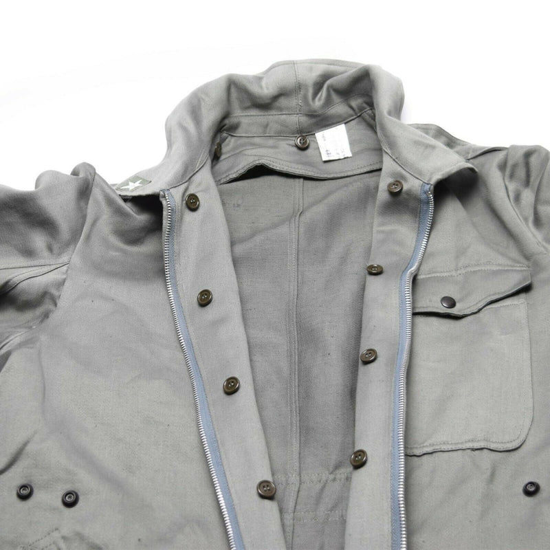 Close-up of genuine Italian Army military grey coverall suit with zip-front and button details on collar and pocket