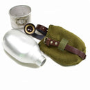 Vintage Romanian army canteen set with metal water bottle, olive green wool felt cover, cup, and strap isolated on white background