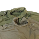 Two vintage Czech army M85 field jackets in olive green with button-up collars and shoulder epaulets.