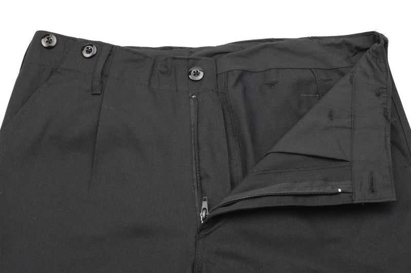 Close-up of black German Army style BDU cargo pants waistband and zipper detail made from durable fabric