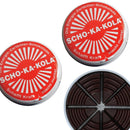 Two closed and one open 100g tin cans of German SCHO-KA-KOLA dark chocolate with caffeine segments visible inside.