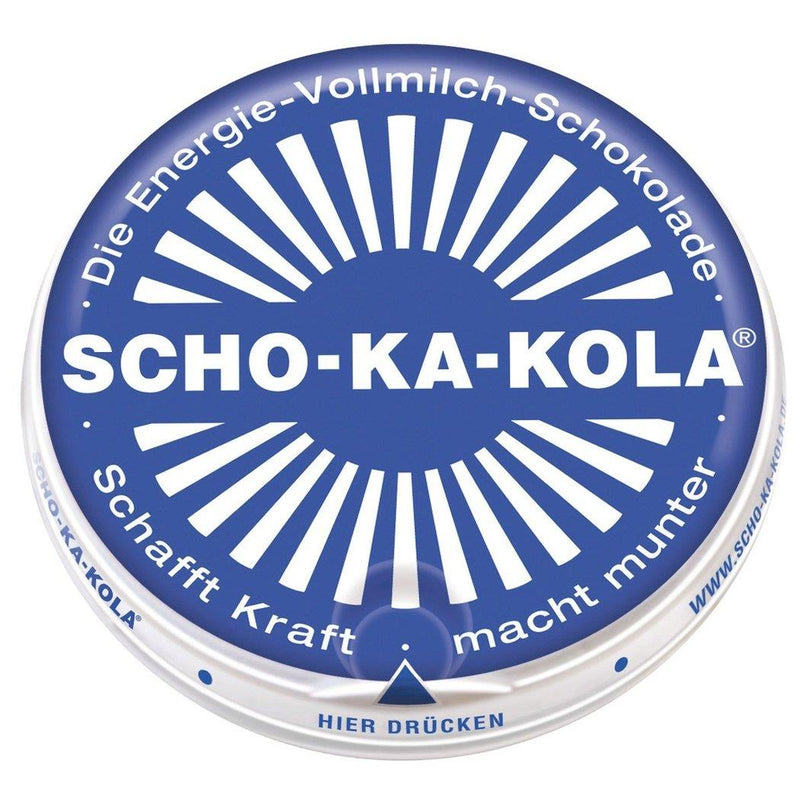 Blue round tin of German Scho-Ka-Kola whole milk chocolate with energy-boosting caffeine, 100g package.