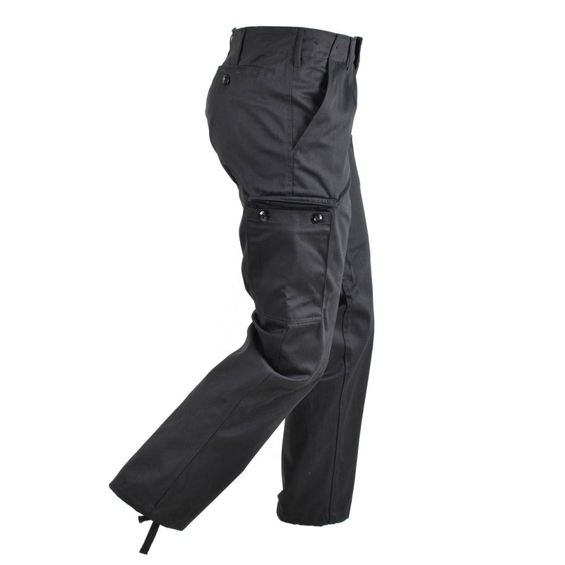 Black German military style moleskin cargo pants with durable fabric and adjustable bottom cuffs for versatile wear.