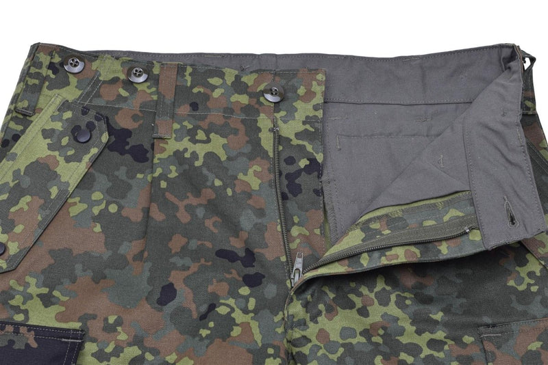 Close-up of Leo Kohler BDU pants in Bundeswehr Flecktarn camo with open zipper and button details.
