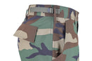 Close-up of MIL-TEC U.S. Army style ripstop BDU pants in woodland camouflage with cargo pocket and adjustable waist strap