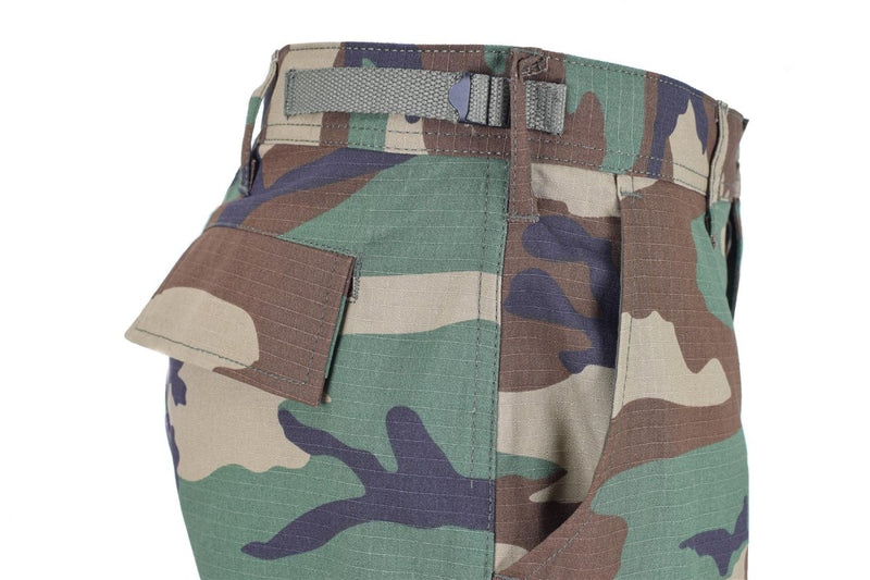 Close-up of MIL-TEC U.S. Army style ripstop BDU pants in woodland camouflage with cargo pocket and adjustable waist strap