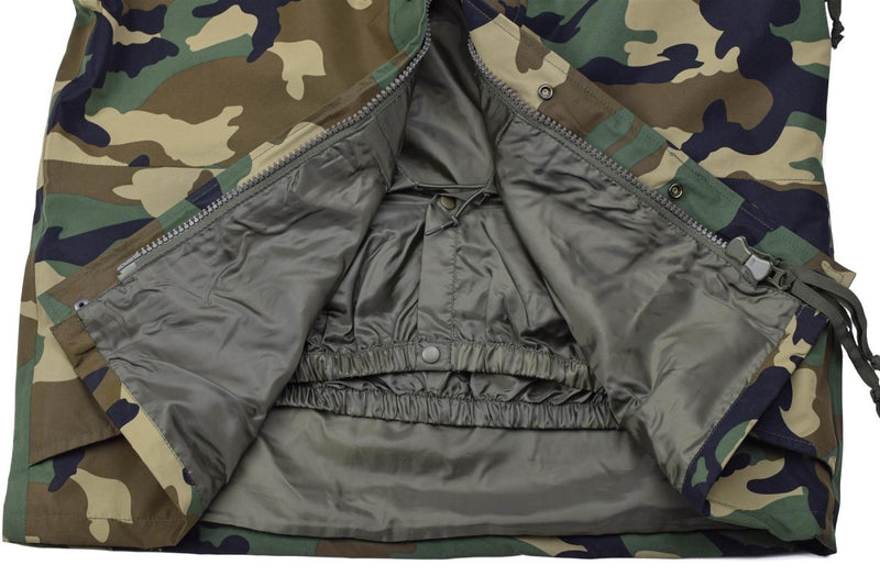 Close-up of the interior of the MIL-TEC woodland camo military style waterproof and windproof tactical jacket.