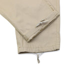 Close-up of khaki Mil-Tec US Army style field pants cuff with adjustable drawstring detail and ripstop fabric texture.