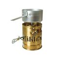 Compact brass Optimus Svea liquid fuel camp stove with aluminum pot and foldable handle for outdoor cooking.