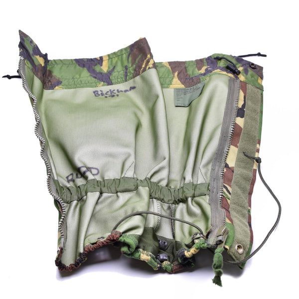 Original British army DPM camouflage waterproof gaiters with adjustable fittings for rugged outdoor protection.