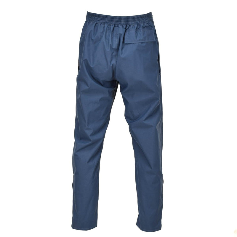 Back view of original British Royal Air Force waterproof blue wet weather trousers for men.