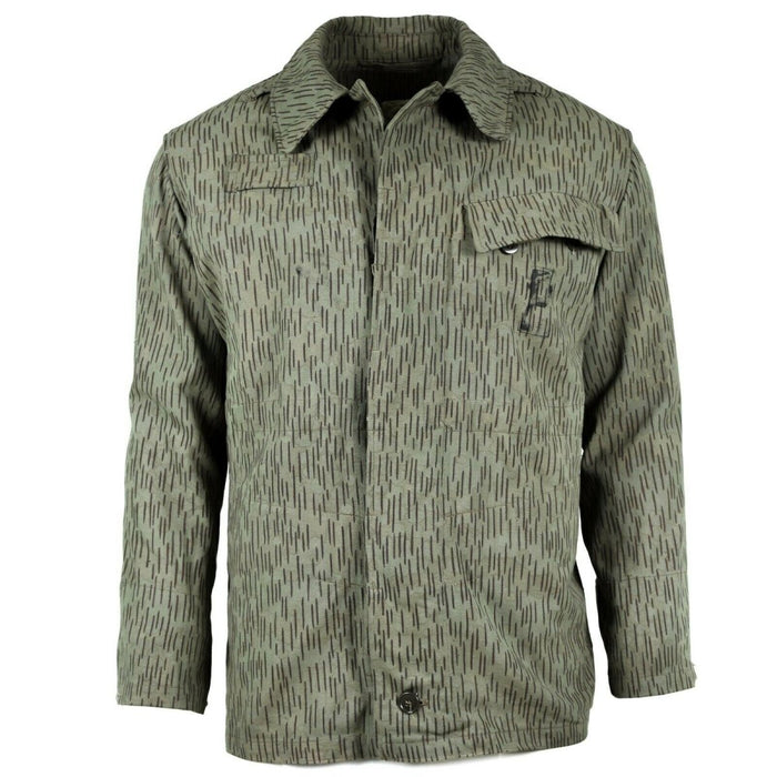 Vintage Czech army M60 field jacket with raindrop camouflage, durable fabric, and multiple pockets for outdoor use.