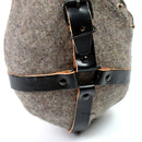 Vintage Czech Army M60 drinking flask with wool cover and black leather straps close-up detail view
