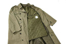 Original Dutch Army trench coat for men in khaki with quilted lining, belted waist, epaulets, and buttoned cuffs.