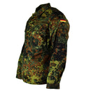 Original German Army shirt in flecktarn camouflage with zipped front, chest and arm pockets, and German flag patch on sleeve.