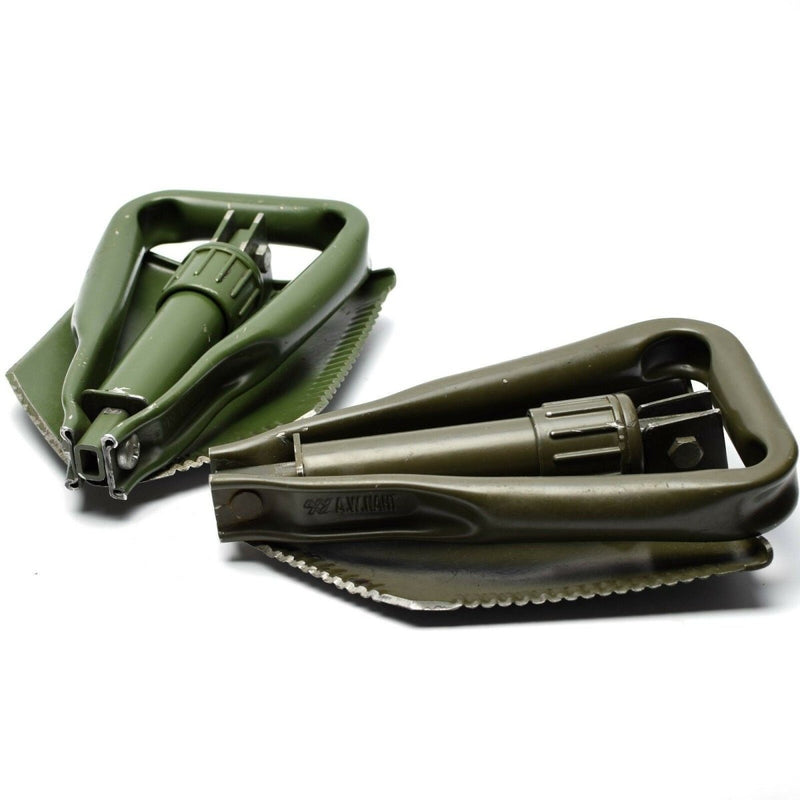 Compact original German BW Army folding shovel in green, durable for survival and outdoor use.