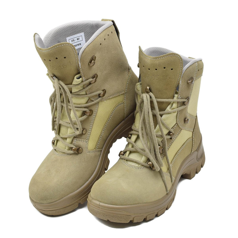Pair of original German military tactical waterproof khaki boots with rubber round sole and lace closure