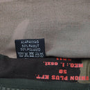 Close-up of a fabric label showing material composition 50% cotton and 50% polyamide in a Hungarian army M1990 field jacket