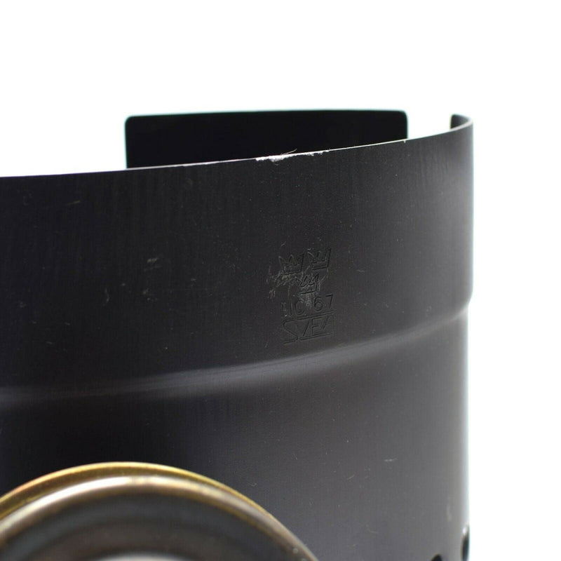Close-up of original Swedish army Trangia SVEA camping stove wind shield and brass spirit burner detail