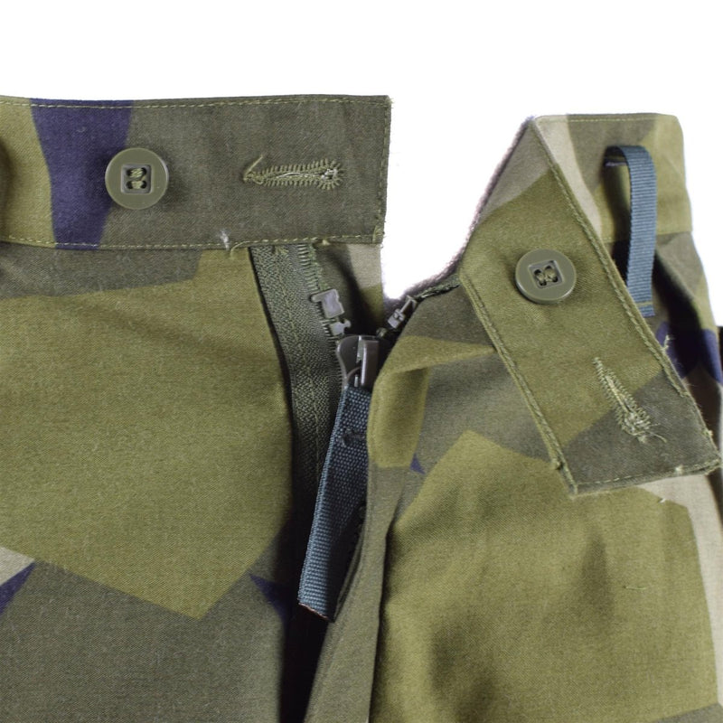 Close-up of Original Swedish Military M90 Splinter camouflage pants zipper and button with durable fabric details
