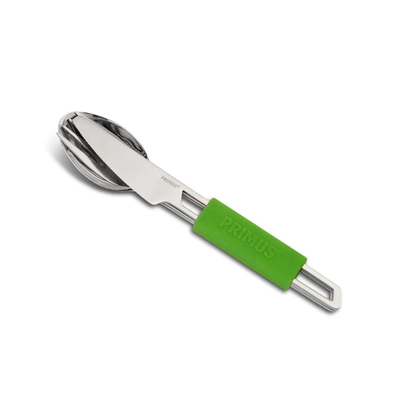 Primus lightweight camping cutlery set with stainless steel knife, fork, spoon, and green silicone handle for outdoor use.