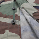 Close-up of TACGEAR French military style commando jacket with CCE camo pattern and durable ripstop fabric buttons.