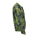 Side view of TACGEAR Swedish military style commando field jacket in splinter camouflage with pockets and reinforced elbows
